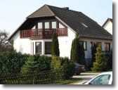 Ansicht Pension von Straße aus